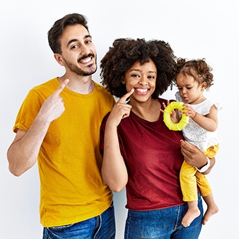 Smiling family after their dental checkup and cleaning in Lewisville