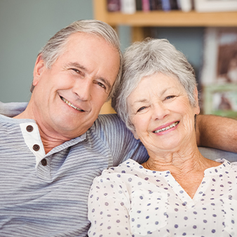 Smiling older man and woman