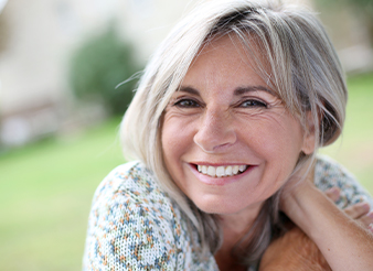 Woman with healthy smile outdoors