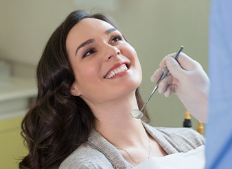 Smiling woman in dental chair