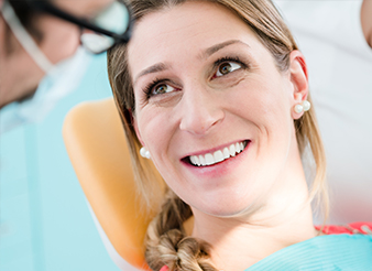 Smiling woman in dental chair