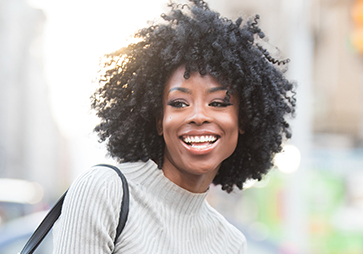 Woman with gorgeous smile outdoors