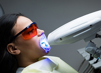 Patient receiving teeth whitening treatment