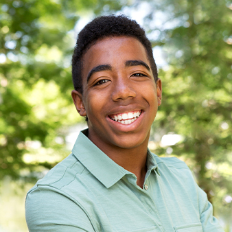 Man smiling outdoors